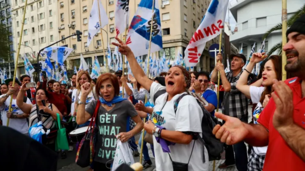 Protesters clash with police outside Argentina’s Congress during demonstrations over Milei’s labour reforms in Buenos Aires