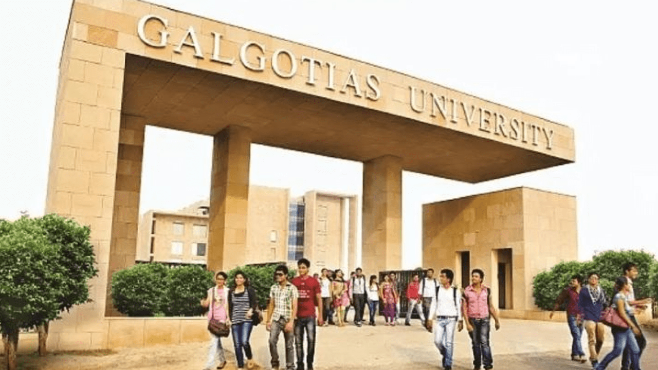 Galgotias University exhibition booth at AI Impact Summit in Delhi featuring Unitree Go2 robotic dog