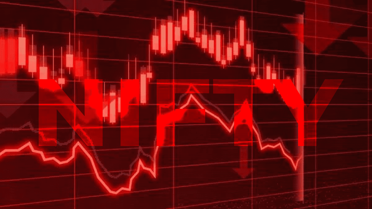 Traders monitor Nifty IT index decline on stock market screens amid AI disruption and Fed rate concerns