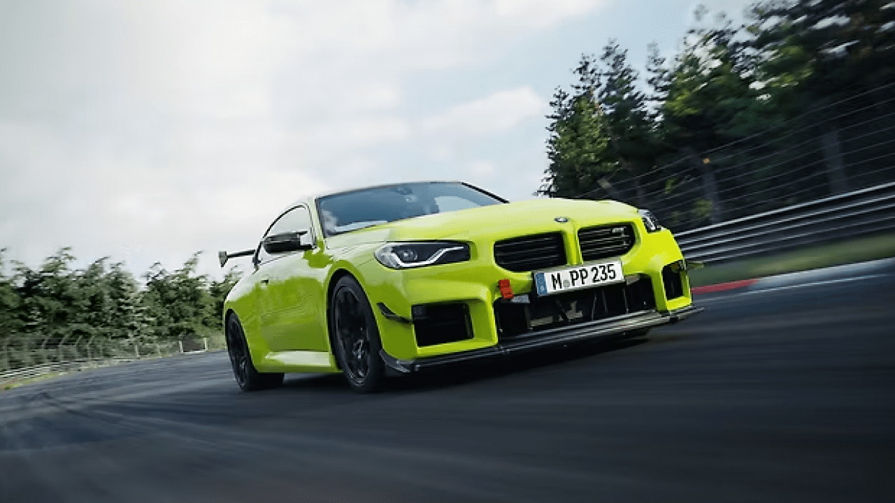 BMW M2 with M Performance Track Kit and upgraded exhaust system, showcasing new aerodynamic components.