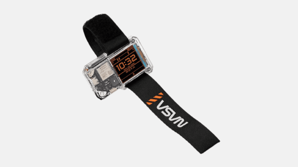 "NASA Artemis Watch 2.0 with a transparent rectangular case revealing internal components like microcontroller, sensors, and display."