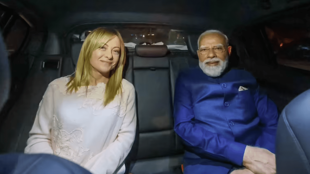 Prime Minister Narendra Modi and Italian PM Giorgia Meloni at the illuminated Colosseum in Rome during diplomatic visit