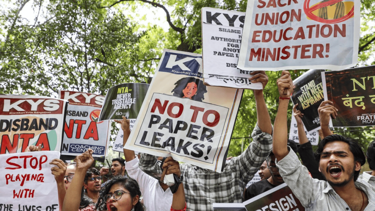 Students outside an examination centre after NEET UG 2026 cancellation amid nationwide paper leak controversy