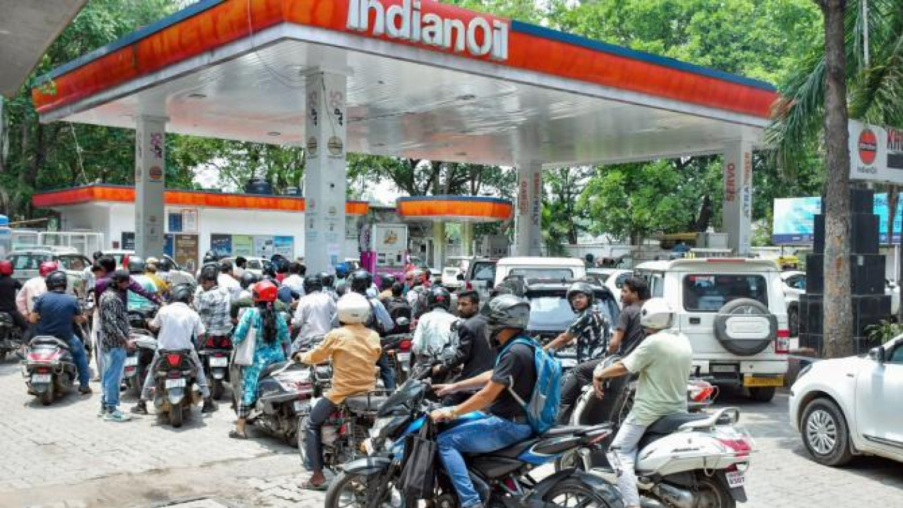 Vehicles lined up at a petrol station in India after fuel prices surged amid the West Asia oil crisis