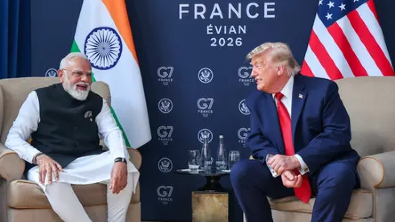 Prime Minister Narendra Modi and US President Donald Trump meeting during the G7 Summit in Evian, discussing India-US trade deal and strategic cooperation.