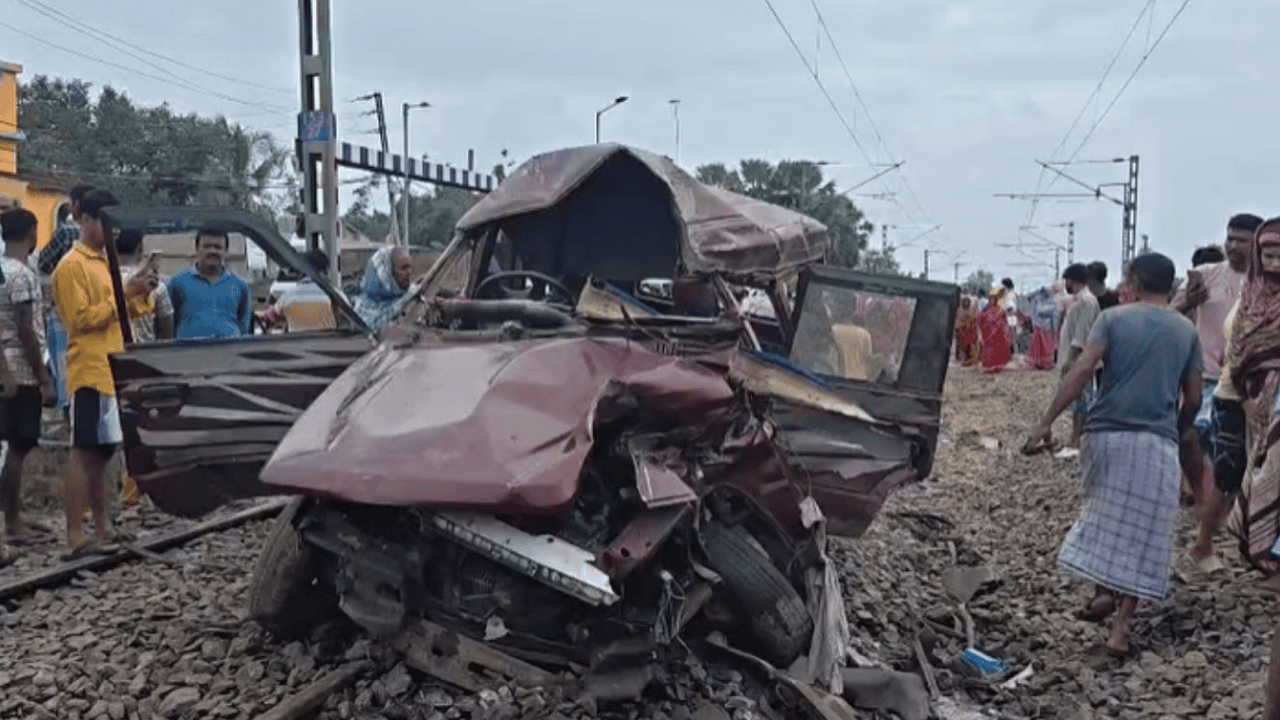 Crushed school van after the Murshidabad train-school van collision at a railway level crossing in West Bengal.